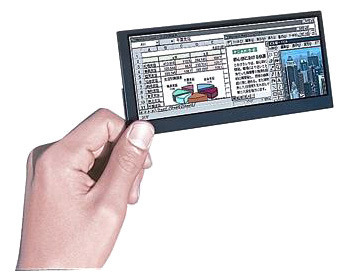 A small hand-sized display held between finger and thumb