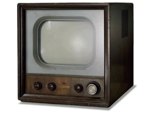 an old wood surround television set