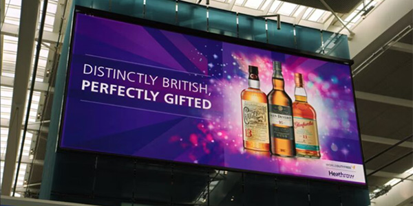 An advertisement for spirits shown on a digital screen