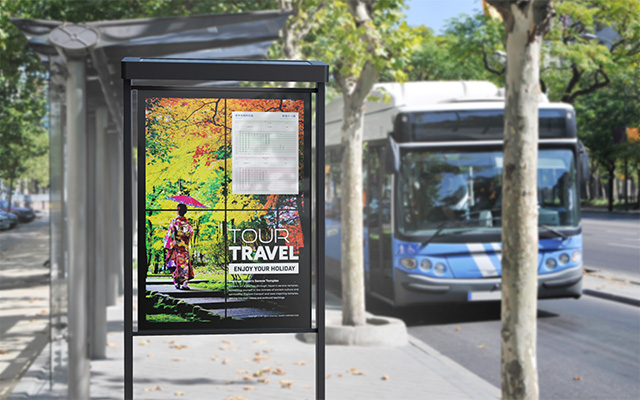 A bus stop with digital poster advertising